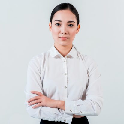 portrait-young-asian-businesswoman-with-her-arm-crossed-looking-camera-isolated-white-background (1) (1) (1)